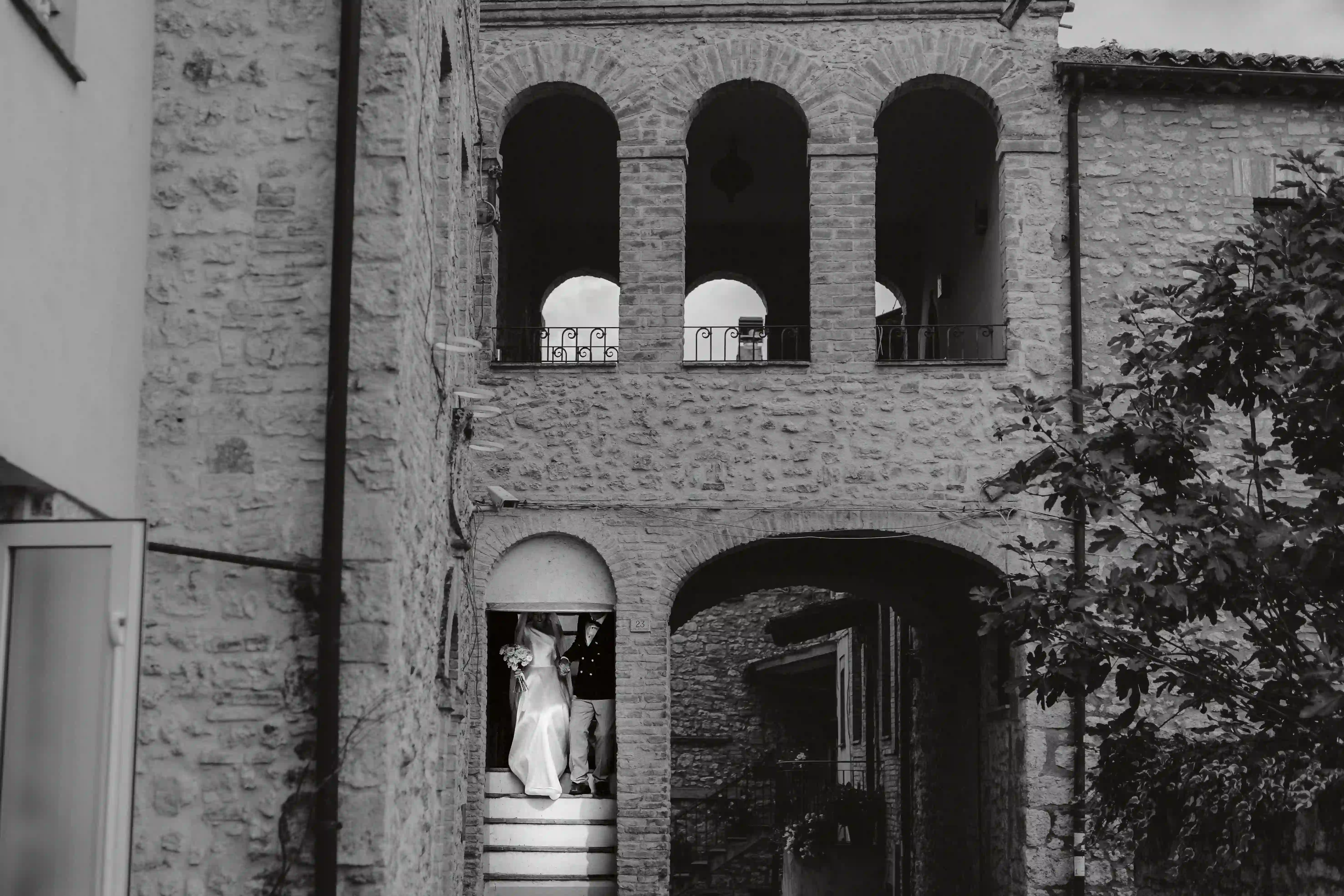 Couple under the village arch